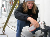 Ida collecting a nutrient sample