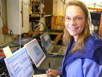 Kelly at her desk in the ship's lab