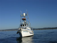 The R/V Shana Rae helps with bringing equipment and people out to the R/V New Horizon