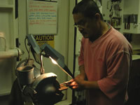 Eddie working in the machine shop