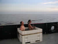 Brian and Elisa “hot-tubbing” on the back deck